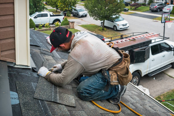 Professional Roofing technician working in Knox, IN